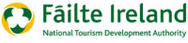 Fáilte Ireland logo, featuring a green shamrock emblem next to the text for the National Tourism Development Authority.