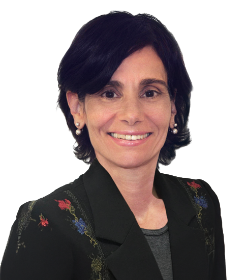 Portrait of a woman with dark hair wearing a black jacket, embroidered details, and pearl earrings, smiling.